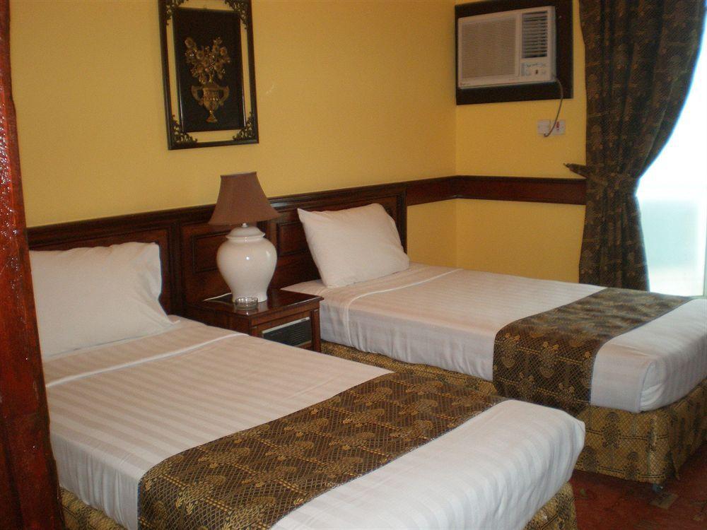 Concord International Hotel Манама Номер фото