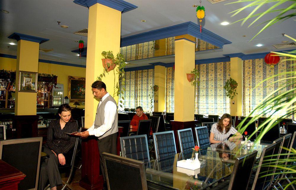 Concord International Hotel Манама Ресторан фото