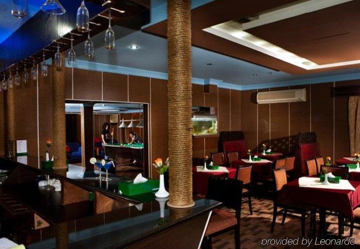 Concord International Hotel Манама Ресторан фото